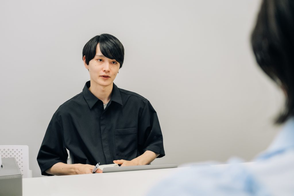 取材者で大学生の山下和真